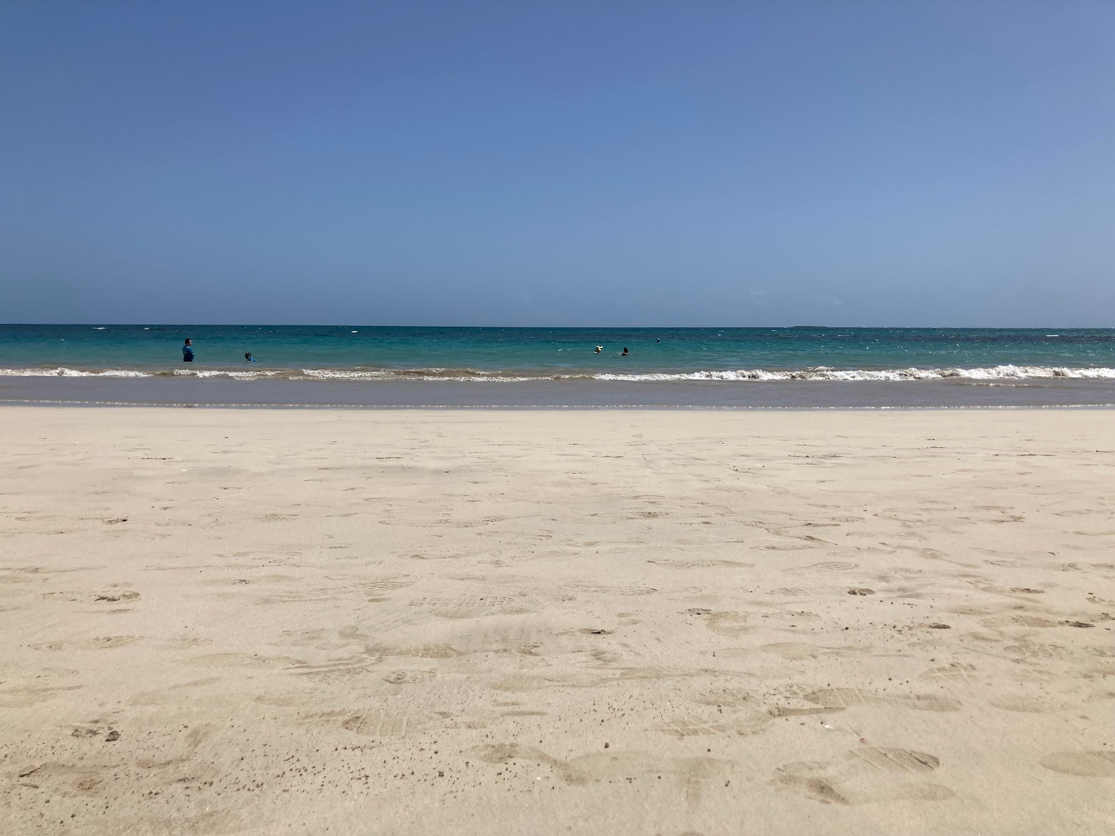 Photo of Isla Verde beach and the settlement