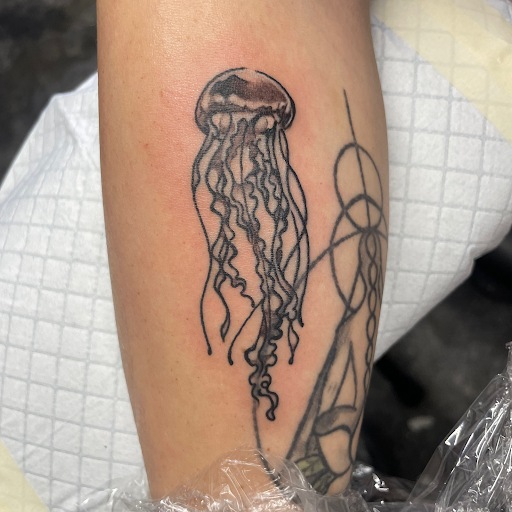 Explore dachshund tattoo ideas, creative tattoo ideas in Laredo, available at Horikawa Tattoo & Piercing Studios