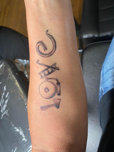 Explore cute boyfriend name tattoo ideas, creative tattoo ideas in Canton, available at The Inkeepers Tattoo Parlor