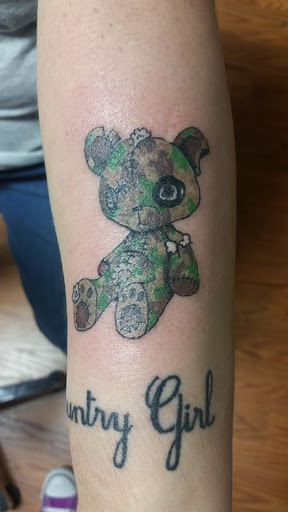 Tattoo Shop «Evil ink tattoo & piercings smokeshop», reviews and photos, 109 Hot Wheels Ln, McMinnville, TN 37110, USA