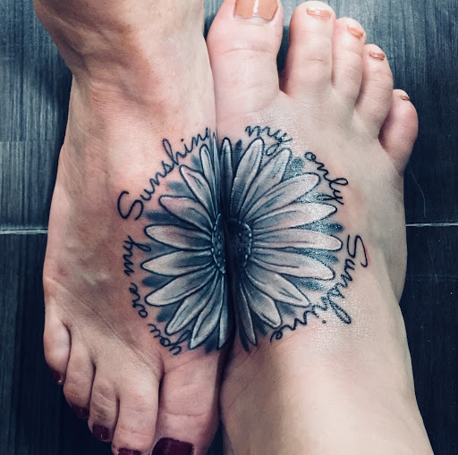 Explore upper leg tattoo ideas, creative tattoo ideas in Utica, available at Tattoo U Studio