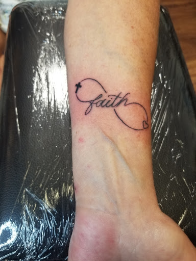 Explore long skinny tattoo ideas, creative tattoo ideas in Keyport, available at Taboo Tattoos