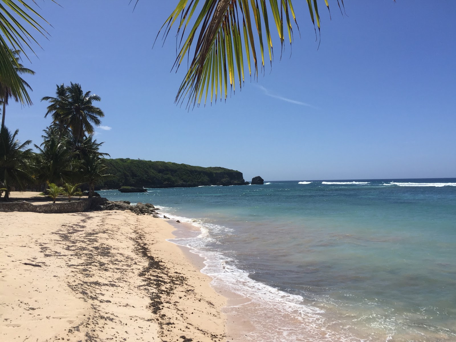 Φωτογραφία του Playa Privada Caribe με φωτεινή άμμος επιφάνεια