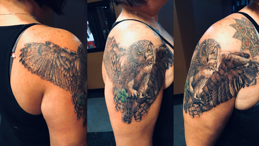 Explore women's side tattoo ideas, creative tattoo ideas in Englewood, available at Point of Entry Tattoo