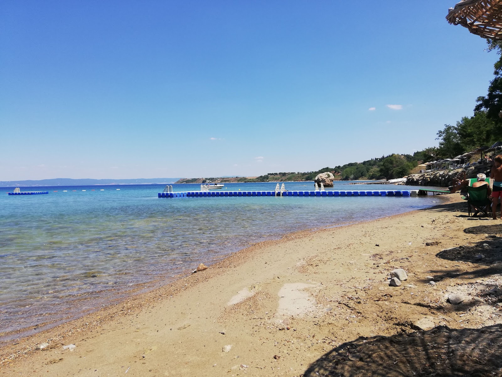 Zdjęcie Yidiz bay beach z powierzchnią piasek z kamykami