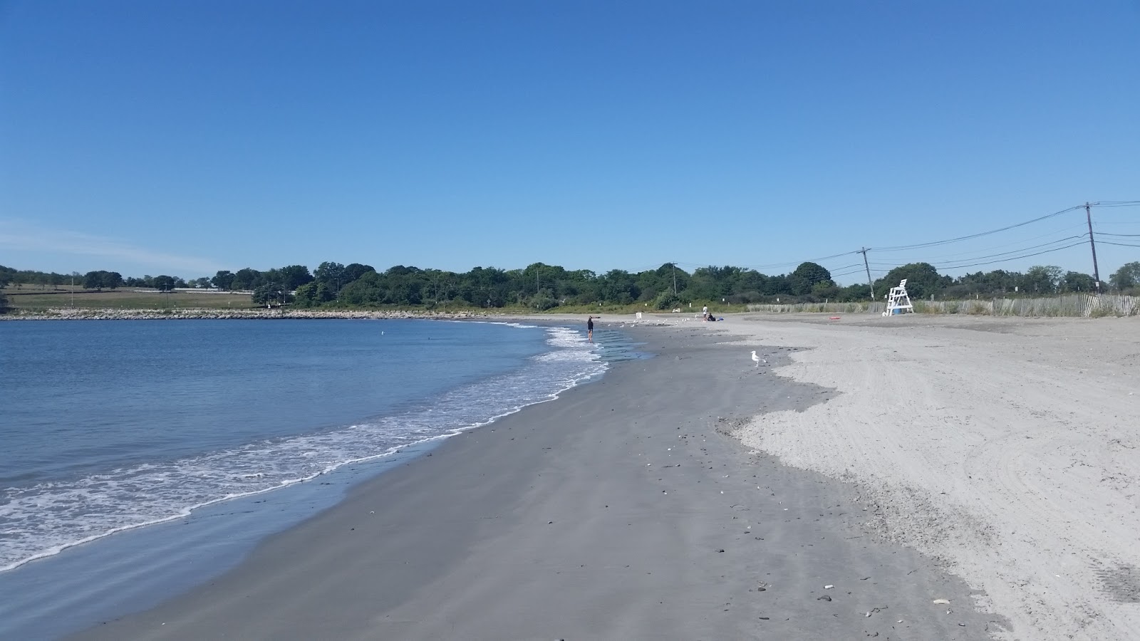 Fotografija Mackeral Cove Beach z siv pesek površino