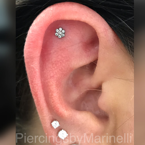 Explore woodstock tattoo ideas, creative tattoo ideas in Wilmington, available at Studio Seven Piercing