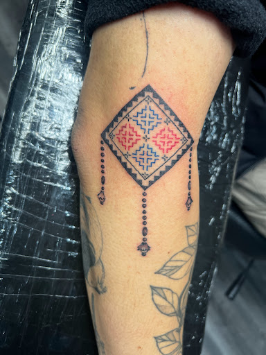 Explore iowa hawkeye tattoo ideas, creative tattoo ideas in Minneapolis, available at Ink Addictionz Tattoo