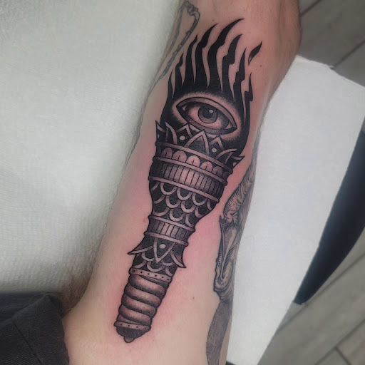 Explore side leg tattoo ideas, creative tattoo ideas in Painesville, available at The Inkwell Tattoo Company