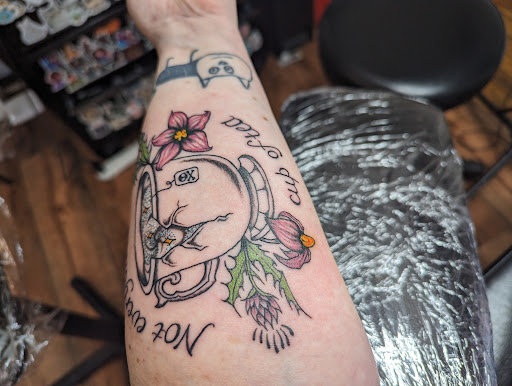 Explore dragonfly tattoo ideas for females, creative tattoo ideas in Platteville, available at Legacy Impressions Tattoos & Piercings