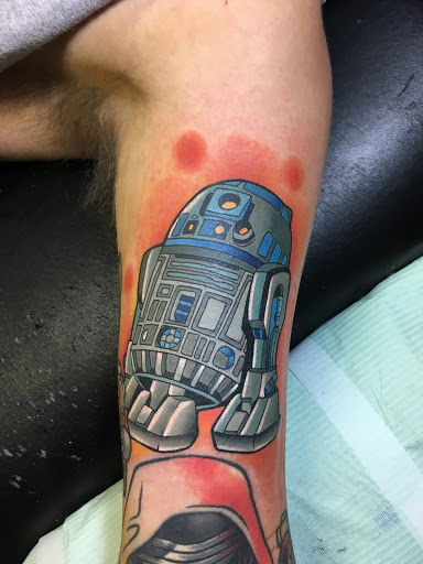 Explore tattoo ideas on inner arm, creative tattoo ideas in Erie, available at Wayward Tattoo Studio