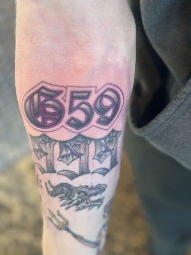 Explore women's spine tattoo ideas, creative tattoo ideas in Rockford, available at Tattoo Bobs