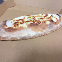 Calzone du Pizzeria Oh'Mapizza au feu de bois à Sannois - n°1