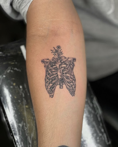 Explore ladies side tattoo ideas, creative tattoo ideas in Peoria, available at Modern Ink Tattoo