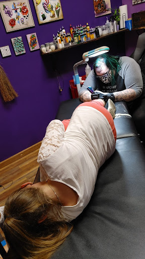 Explore wedding ring tattoo cover up ideas, creative tattoo ideas in Bloomington, available at Crystal Moon Body Arts