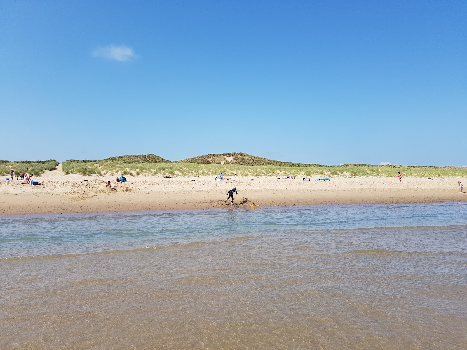 Photo of Old Bawn Beach with turquoise pure water surface