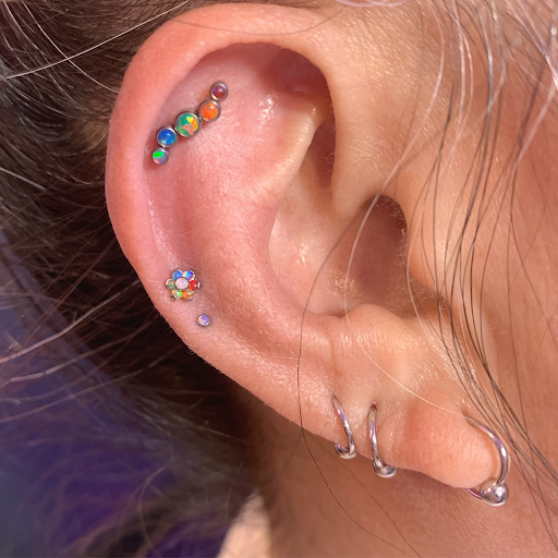 Explore superhero tattoo ideas, creative tattoo ideas in Fort Walton Beach, available at Piercings by Torrie