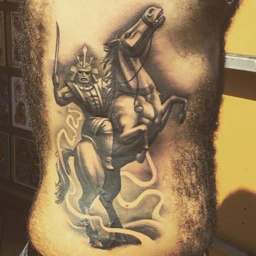 Explore beauty and the beast tattoo ideas, creative tattoo ideas in West Palm Beach, available at TBA Tattoos