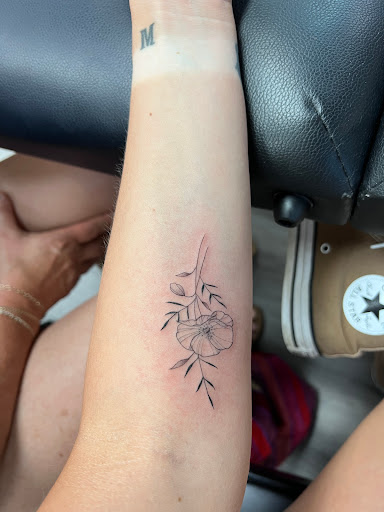 Explore chanel tattoo ideas, creative tattoo ideas in Denver, available at Ikonik Ink Tattoo