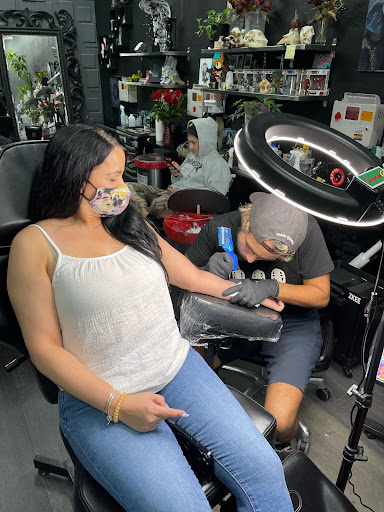 Explore small black tattoo ideas, creative tattoo ideas in Hollywood, available at Sacred Eye Tattoos