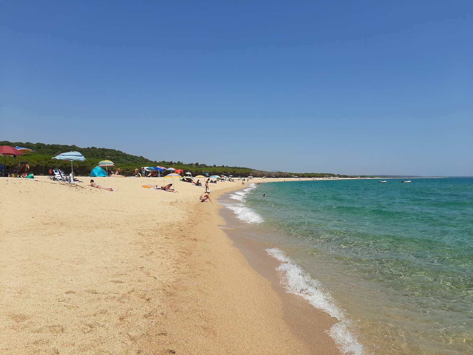 Foto de Praia Osalla e o assentamento