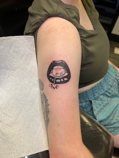 Explore unique side thigh tattoo ideas, creative tattoo ideas in Rocky Hill, available at Xclusive Ink II