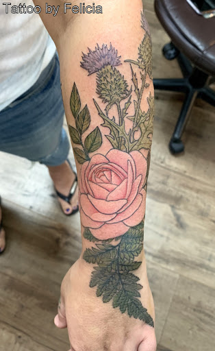 Explore ectopic pregnancy tattoo ideas, creative tattoo ideas in Fort Myers, available at Tiger Lotus Tattoo and Piercing
