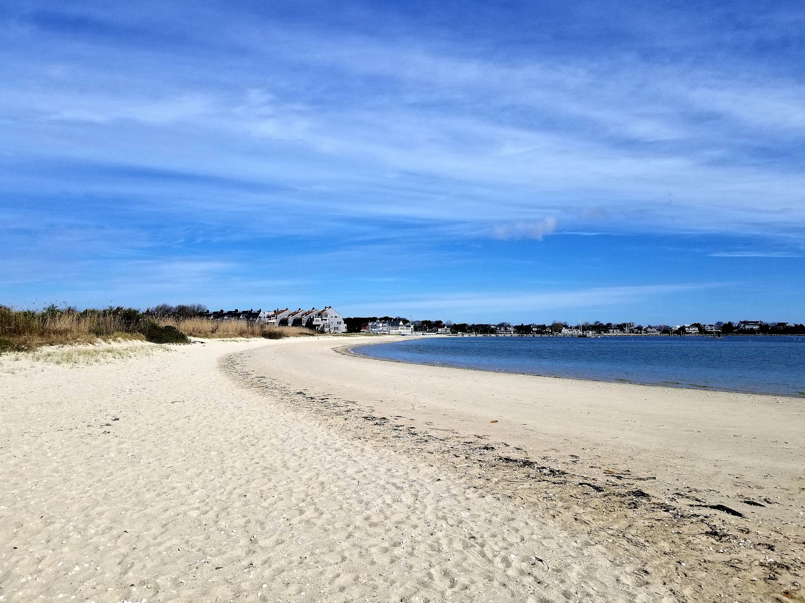 Foto av Kalmus Park Beach med ljus sand yta