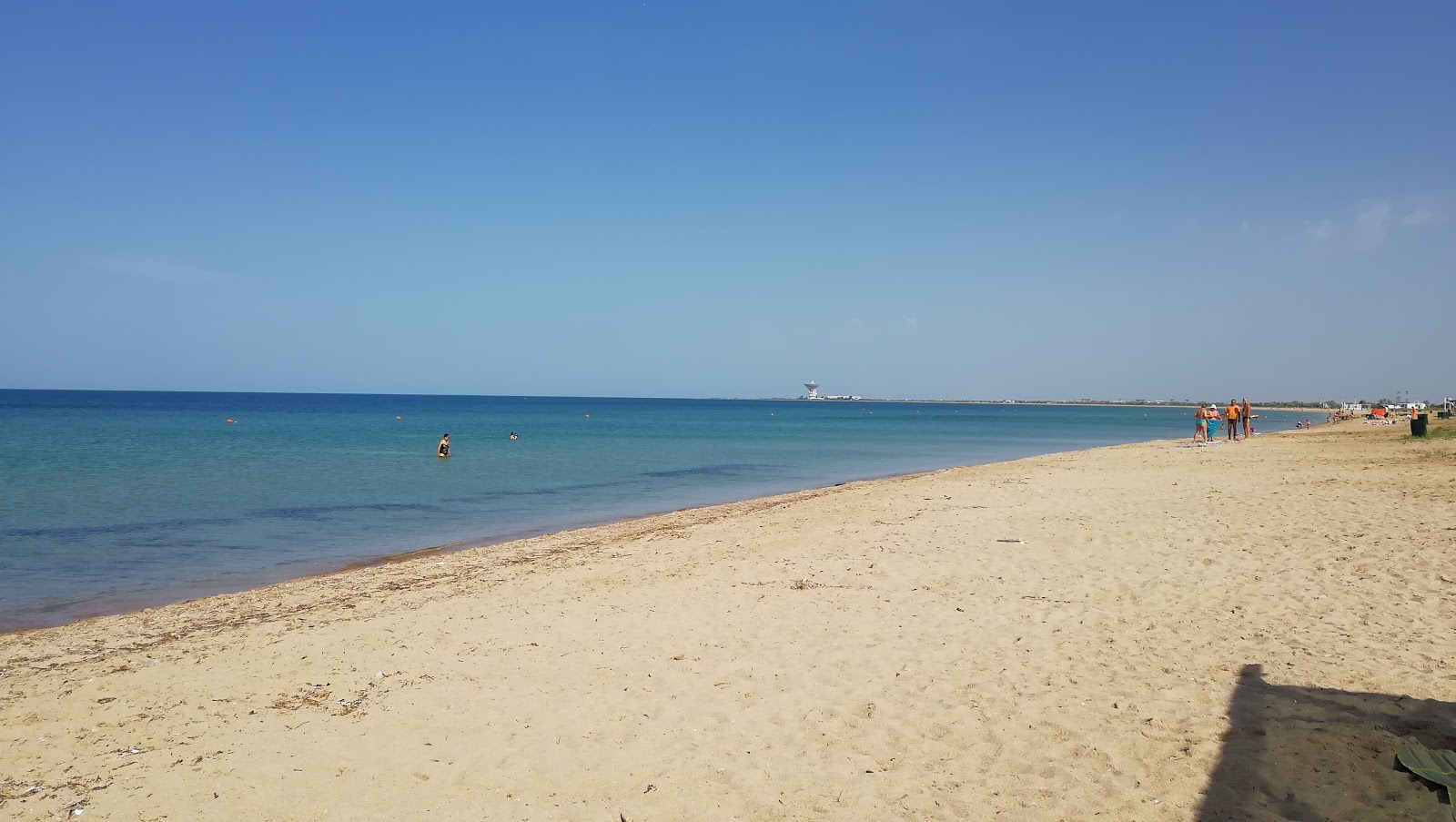 Foto av Zaozernoe beach III med beige sand yta