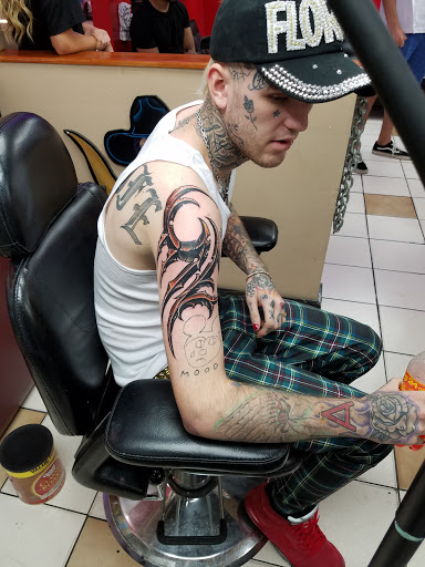 Explore cover up tattoo ideas for leg, creative tattoo ideas in Tampa, available at Las Vegas Tattoo Co