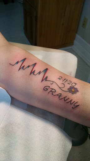 Explore simple spine tattoo ideas, creative tattoo ideas in Hanceville, available at Wildman Tattoo and Body Piercing