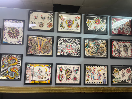 Explore black power tattoo ideas, creative tattoo ideas in Orange Park, available at Big City Tattoo and Piercing