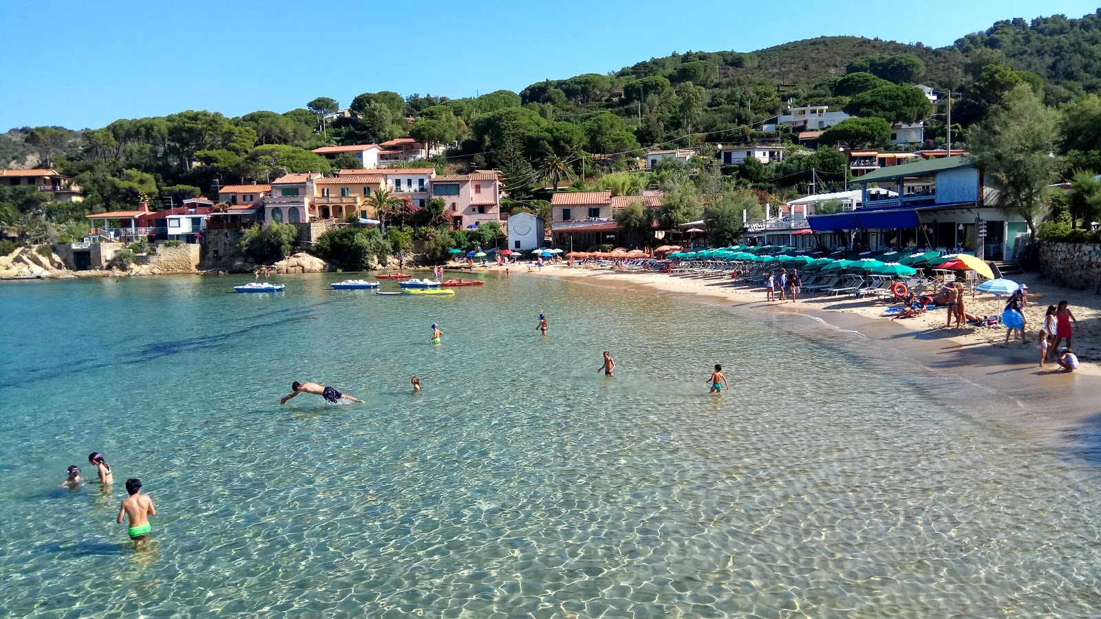 Photo of Scaglieri Beach with bright fine sand surface