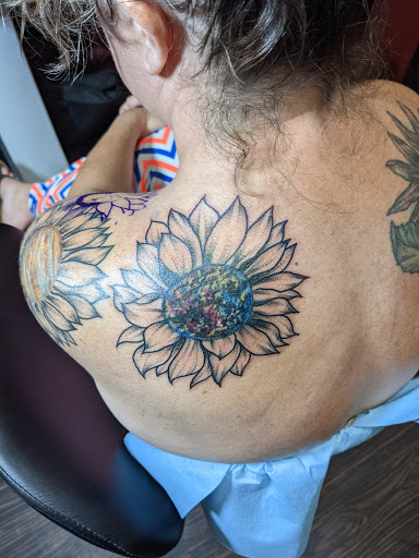 Explore leg tattoo ideas woman, creative tattoo ideas in Huntsville, available at Blacktide Tattoo Co.