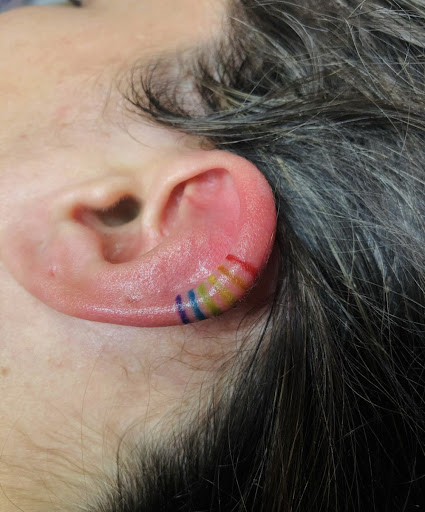 Explore barbell tattoo ideas, creative tattoo ideas in North Tonawanda, available at Dark Side Ink Tattoo Studio