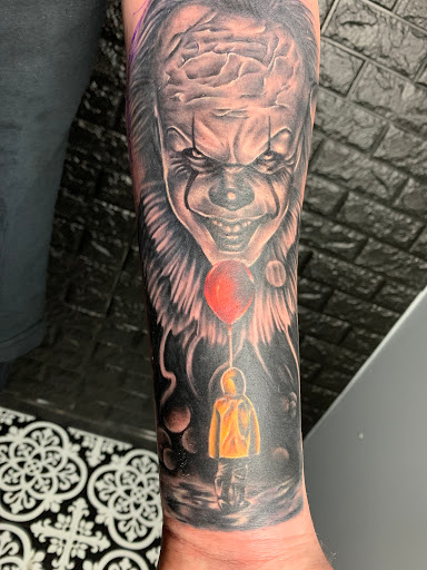 Explore floral hand tattoo ideas, creative tattoo ideas in Kenosha, available at Kenosha Tattoo Company
