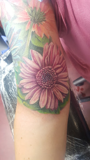 Explore upper arm sleeve tattoo ideas, creative tattoo ideas in Ventura, available at Ventura Tattoo & Piercing