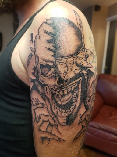 Explore wrestling tattoos ideas, creative tattoo ideas in Salem, available at Body Graphix Tattoo Studio