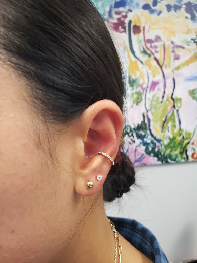 Explore rapper tattoo ideas, creative tattoo ideas in Bellevue, available at Just Your Ears Piercing & Permanent Jewelry Studio