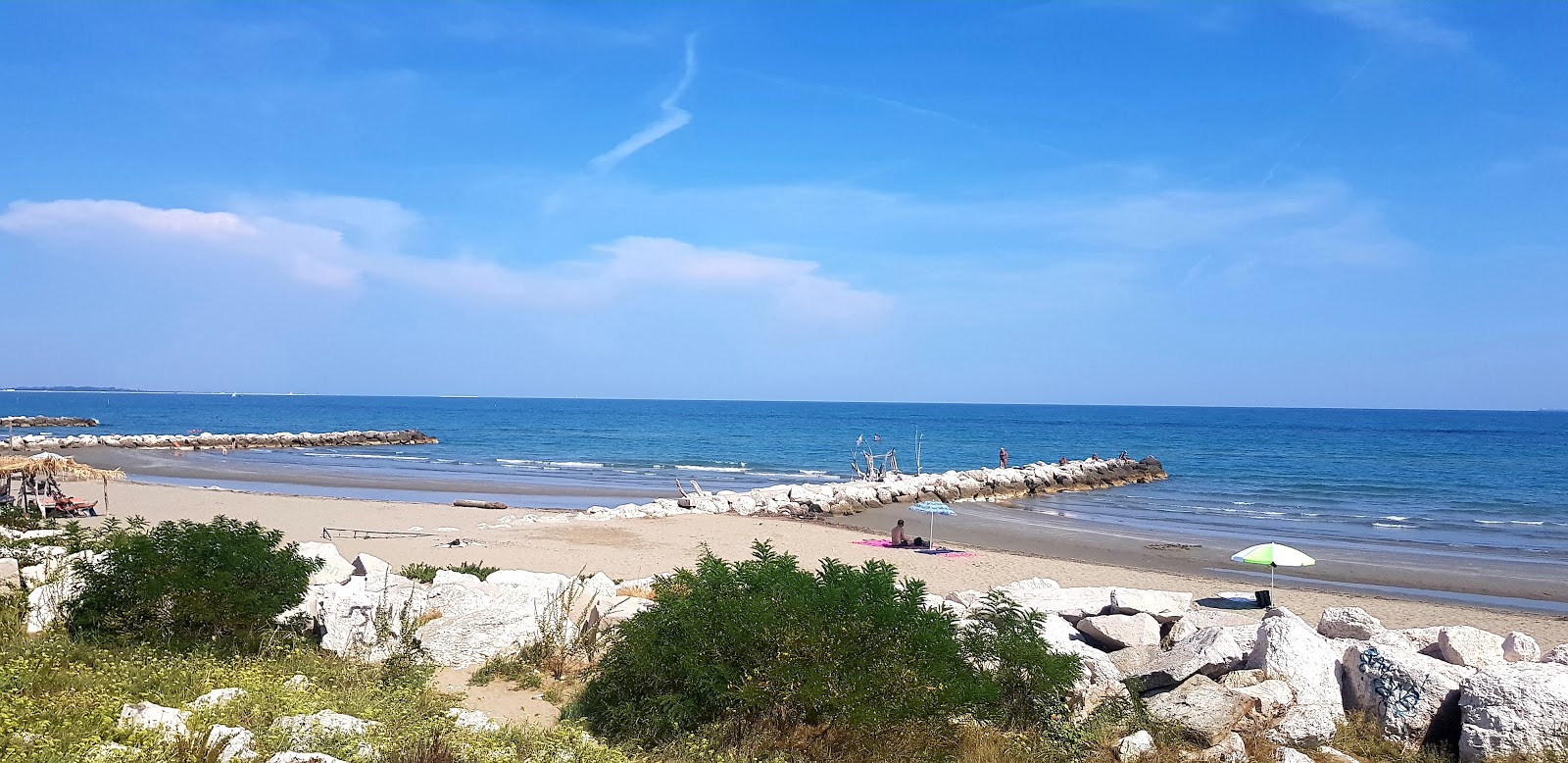 Fotografija Murazzi Spiaggia Libera z svetel pesek površino