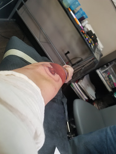 Explore mens knee tattoo ideas, creative tattoo ideas in Virginia Beach, available at Whiskey River Tattoo