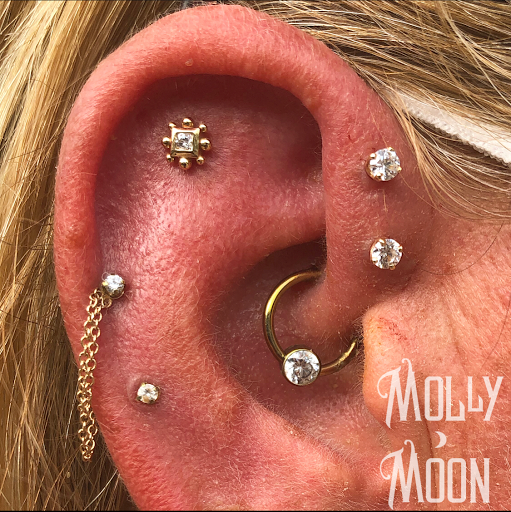 Explore ideas for a tattoo for my son, creative tattoo ideas in Oshkosh, available at Piercings by Molly Moon at 920 Tattoo and Piercing