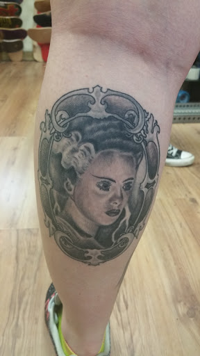 Explore back tattoo ideas for females, creative tattoo ideas in Harrisburg, available at Rayzor Tattoos