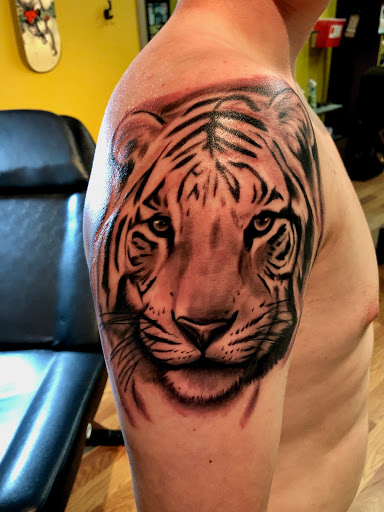 Explore small stitch tattoo ideas, creative tattoo ideas in Covington, available at Cupid Slave Tattoo Company