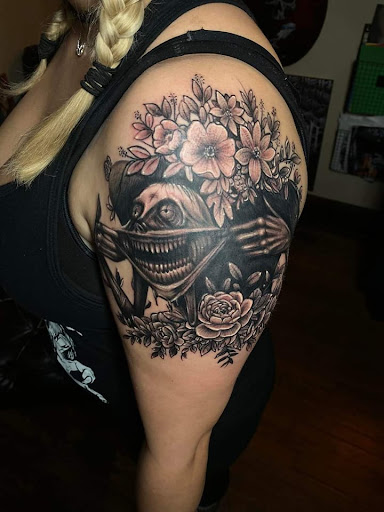 Explore daisy flower tattoo ideas, creative tattoo ideas in Canton, available at The Inkeepers Tattoo Parlor