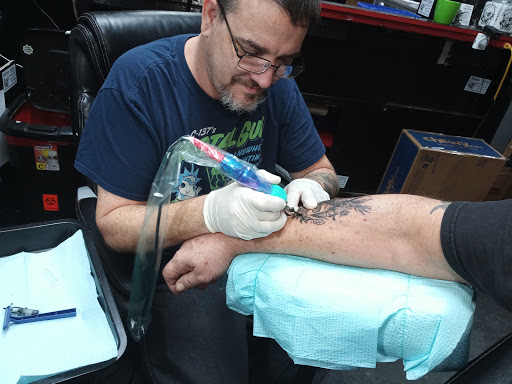 Explore 0311 tattoo ideas, creative tattoo ideas in Largo, available at Alchemy Tattoos and Body Piercings