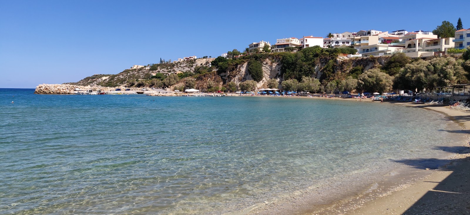 Photo of Almirida beach with partly clean level of cleanliness