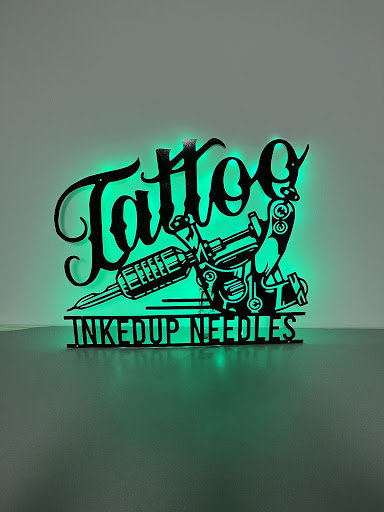 Explore cute woman tattoo ideas, creative tattoo ideas in La Vista, available at InkedUp Needles