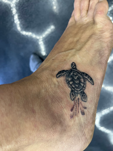 Explore country tattoo ideas for guys, creative tattoo ideas in Fort Gratiot, available at Sarenity Tattoo & Body Piercing