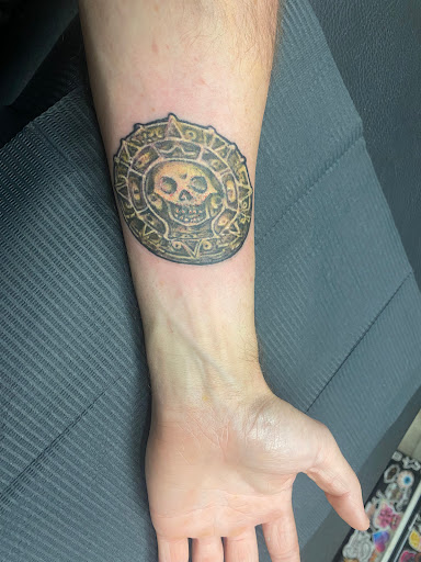 Explore wisdom tattoo ideas, creative tattoo ideas in Asheville, available at Valiant Inscriptions